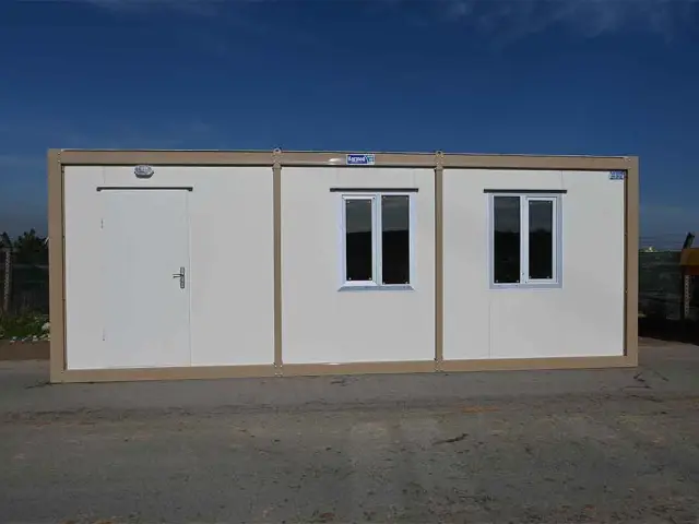 Standard container unit seen front-on, showing the default door and window layout