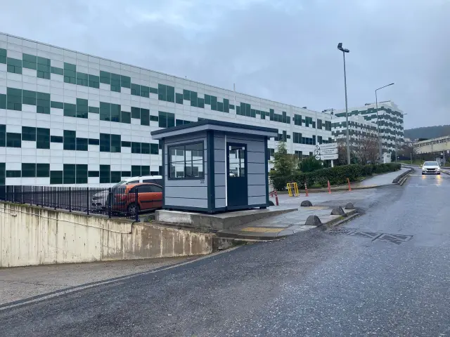 MetroCity gatehouse beside the barrier at a university vehicle entrance in winter weather